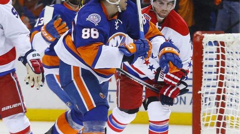Eastern Conference quarterfinals Game 6: Islanders vs. Capitals 65 Nikolay Kulemin of the New York Islanders celebrates his third-period goal against the Washington Capitals during Game 6 of the Eastern Conference quarterfinals at Nassau Coliseum on Saturday, April 25, 2015.