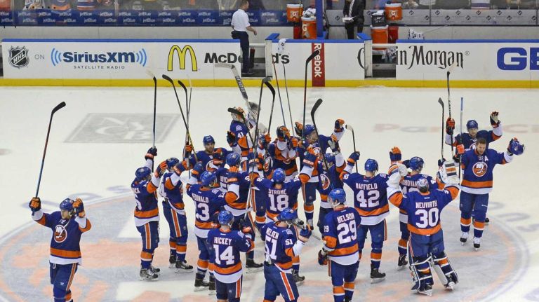 Eastern Conference quarterfinals Game 6: Islanders vs. Capitals 77 The New York Islanders salute their fans at center ice as they celebrate their victory over the Washington Capitals in Game 6 of the Eastern Conference quarterfinals at Nassau Coliseum on Saturday, April 25, 2015.