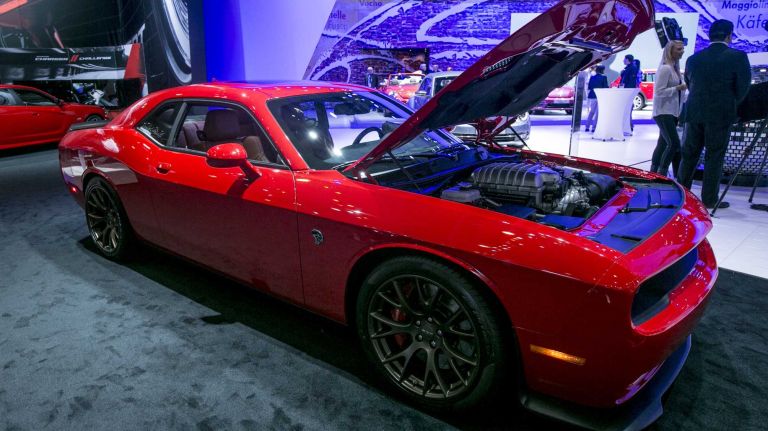 The 2015 Dodge Challenger SRT Hellcat features a whopping 707 hp and with its supercharged 6.2L Hellcat engine is the most powerful production V-8 engine ever. Prices start at $59,995.