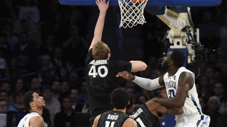 Xavier Musketeers center Matt Stainbrook sinks a shot against the Villanova Wildcats during the final game of the Big East basketball tournament at Madison Square Garden on Saturday, March 14, 2015.