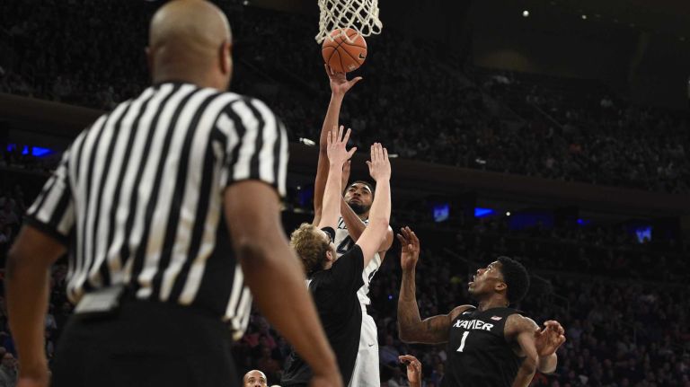 Villanova Wildcats guard Darrun Hilliard II sinks a layup against the Xavier Musketeers during the final game of the Big East basketball tournament at Madison Square Garden on Saturday, March 14, 2015.