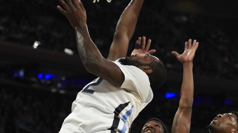 Villanova Wildcats forward JayVaughn Pinkston puts up a shot against the Xavier Musketeers during the final game of the Big East basketball tournament at Madison Square Garden on Saturday, March 14, 2015.
