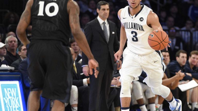 Villanova Wildcats guard Josh Hart controls the ball against the Xavier Musketeers during the final game of the Big East basketball tournament at Madison Square Garden on Saturday, March 14, 2015.
