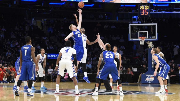 Creighton Bluejays center Geoffrey Groselle takes the opening tip-off against DePaul Blue Demons forward Forrest Robinson in the first round of the Big East basketball tournament at Madison Square Garden on Wednesday, March 11, 2015. 