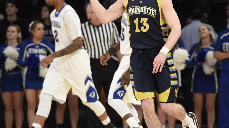 Big East Tournament first round: Marquette vs. Seton Hall 50 Marquette Golden Eagles guard Matt Carlino reacts after sinking a three-point shot against the Seton Hall Pirates in the first round of the Big East basketball tournament at Madison Square Garden on Wednesday, March 11, 2015.