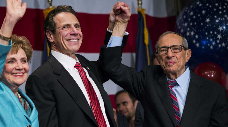 Gov. Andrew M. Cuomo with his father, former Gov. Mario Cuomo, at Andrew Cuomo's election headquarters after making a victory speech Nov. 4, 2014 in Manhattan. At left is Andrew's mother Matilda Cuomo.