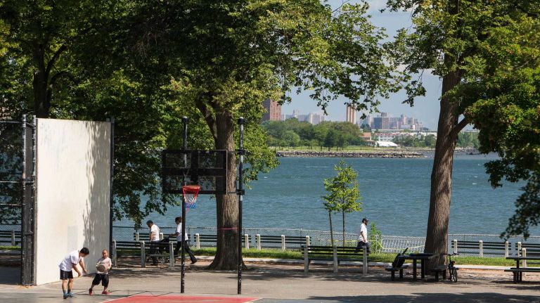 College Point, Queens 34 People enjoying MacNeil Park, it over looking the East River. City Living in the neighborhood of College Point in Queens.August 7, 2015