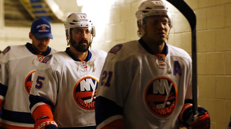Cal Clutterbuck #15 of the New York Islanders takes the ice with his teammates for a game against the New York Rangers at Madison Square Garden on Tuesday, Jan. 13, 2015.