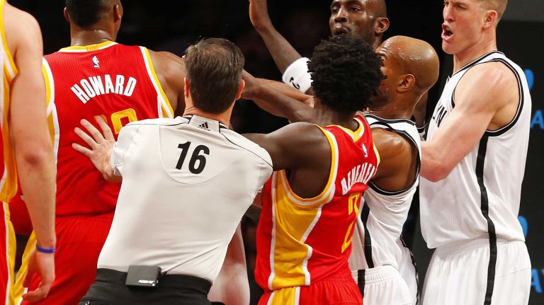 Kevin Garnett #2 of the Brooklyn Nets confronts Dwight Howard #12 of the Houston Rockets in the first quarter of a game at Barclays Center on Monday, Jan. 12, 2015.