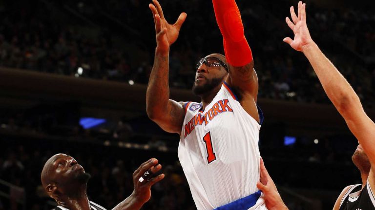 Knicks vs. Nets 31 Amar'e Stoudemire #1 of the New York Knicks puts up a shot for a basket in the first half against the Brooklyn Nets at Madison Square Garden on Tuesday, Dec. 2, 2014.