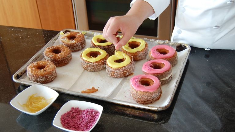 Putting the finishing touches on the DIY Cronuts. 
