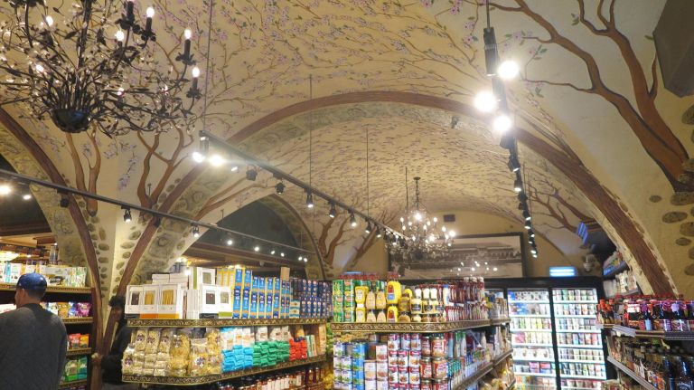 Inside of the Cherry Hill Gourmet Market, the arched ceilings are painted.