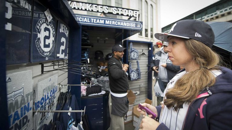 Derek Jeter's final game at Yankee Stadium 174 Nicole Eaton of Rensselaer, N.Y. tries on Yankee hats before entering the stadium for Jeter's final home game against the Baltimore Orioles at Yankee Stadium on Sept. 25, 2014.