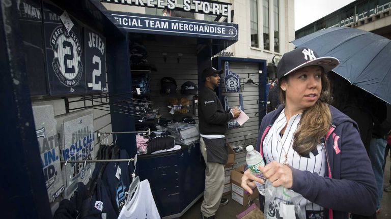 Derek Jeter's final game at Yankee Stadium 177 Nicole Eaton of Rensselaer tries on Yankee hats before entering the stadium for Derek Jeter's final home game against the Baltimore Orioles at Yankee Stadium on Sept. 25, 2014.