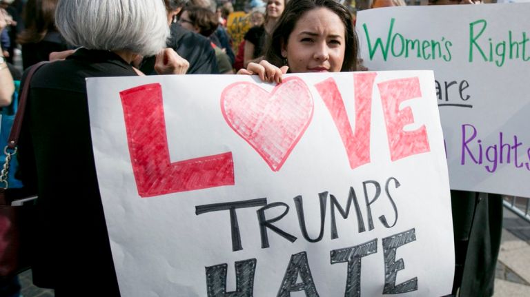 Following comments made by Donald Trump on Wednesday, New Yorkers rallied outside the candidate's Columbus Circle hotel on March 31, 2016.