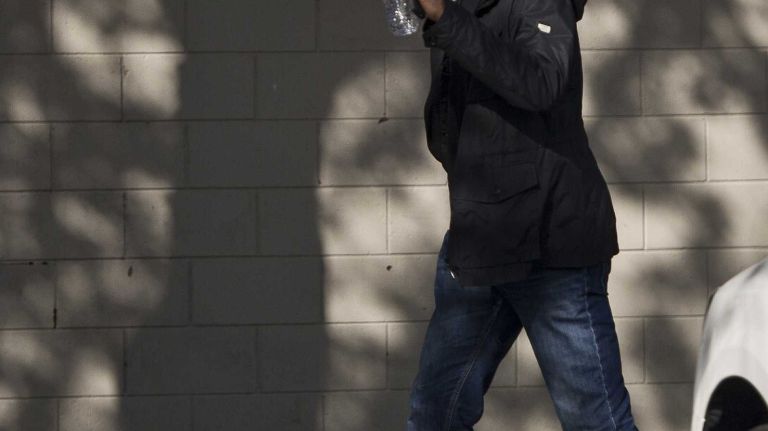Yankees' Derek Jeter arrives at the team's minor-league facility in Tampa, Fla. on the morning of Feb. 13, 2014, prior to the official start of spring training.