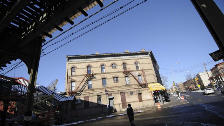 The intersection of Forest Avenue and Fairview Avenue underneath the M train. 