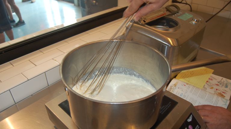 Stir with a hand mixer or whisk until smooth. Make sure the skim milk powder is wholly dissolved into the mixture and that no lumps remain (any remaining sugar granules will dissolve over the heat). 