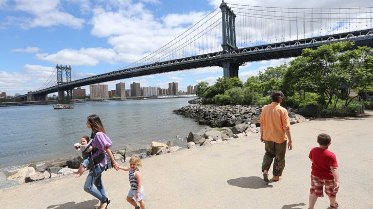Brooklyn Bridge Park with the Manhattan Bridge in the background in Dumbo on Friday, June 6, 2014. 