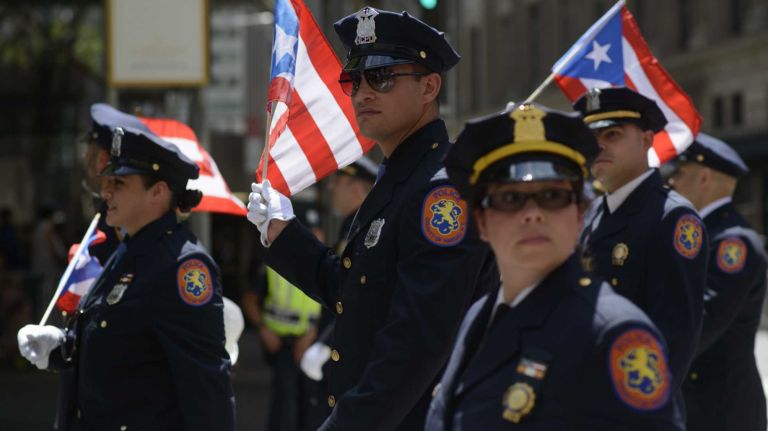 Members of the the Nassau County Police Department march in the 57th annual National Puerto Rican Day Parade in Manhattan on Sunday, June 8, 2014.