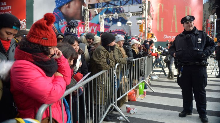 New Year's Eve Times Square ball drop: See photos 43 People wait behind police barriers in Times Square for the New Year's Eve 2017 celebration on Saturday, Dec. 31, 2016.