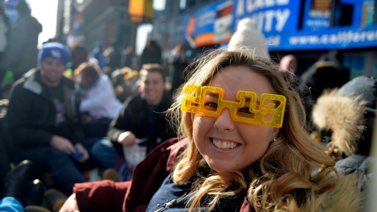 New Year's Eve Times Square ball drop: See photos 45 Melanie Metz, 20, from Rockland, New York, waits in Times Square for the 2017 New Year's Eve celebration on Saturday, Dec. 31, 2016.