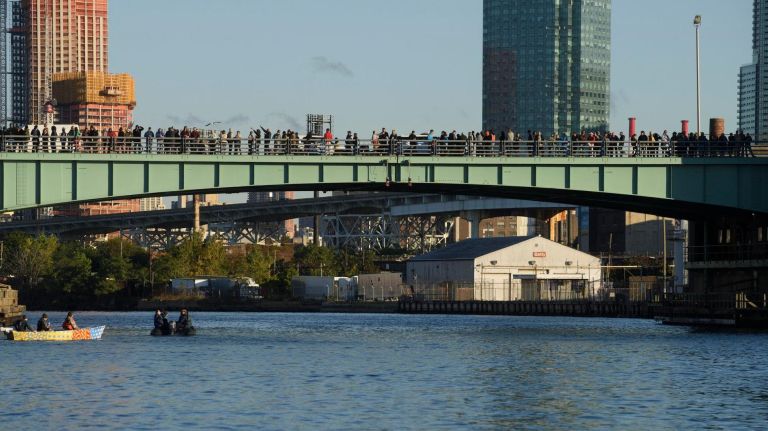 Old Kosciuszko Bridge finally comes down: See photos 11 People watch from the Pulaski Bridge as sections of the old Kosciuszko Bridge are demolished using a process called energetic felling on both the Queens and Brooklyn sides of the Newtown Creek, Sunday,Oct. 1, 2017. The energetic felling required the placement of little charges at key joints on the bridge so that when the charges went off, the bridge broke apart and fell directly down.