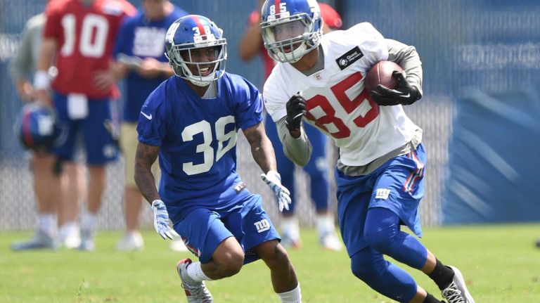 New York Giants safety Justin Currie and wide receiver Donte Foster run drills during the Giants Organized Team Activities at Quest Diagnostics Training Center on Wednesday, June 1, 2016.