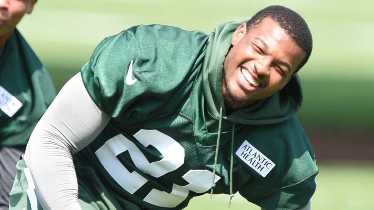 New York Jets cornerback Marcus Gilchrist stretches during warmups at Organized Team Activities at the Jets Training Center on Wednesday, May 25, 2016.