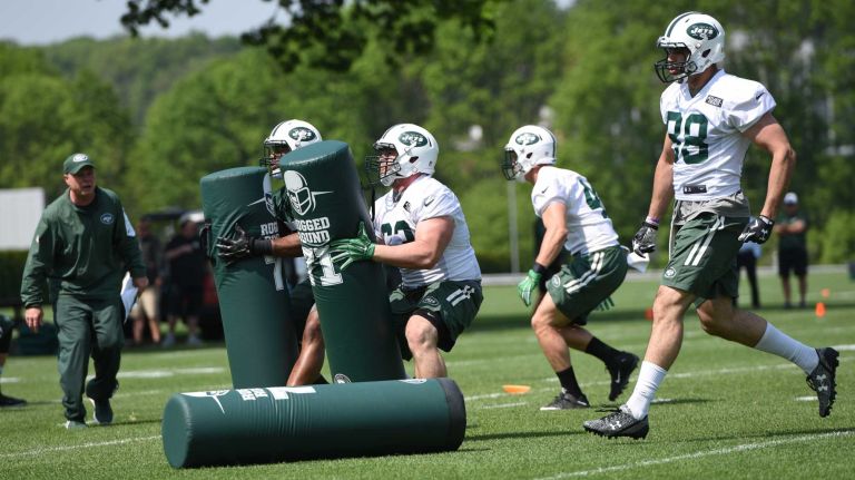 New York Jets players participate in drills during Organized Team Activities at the Jets Training Center on Wednesday, May 25, 2016.