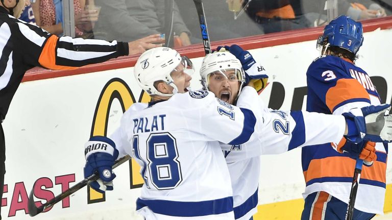 Tampa Bay Lightning right wing Ryan Callahan (24) celebrates with teammate Ondrej Palat (18) after scoring a game-tying goal in the first period in Game 3 of the Eastern Conference semifinals on Tuesday, May 3, 2016 at Barclays Center.