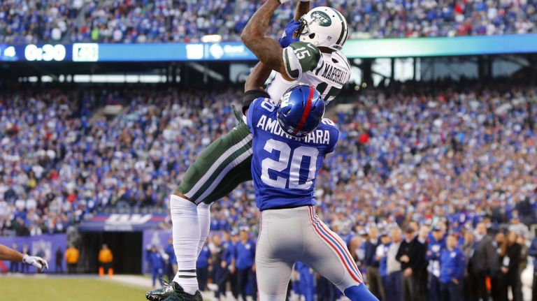Brandon Marshall #15 of the New York Jets hauls in a touchdown late in the fourth quarter against Prince Amukamara #20 of the New York Giants at MetLife Stadium on Sunday, Dec. 6, 2015 in East Rutherford, N.J.