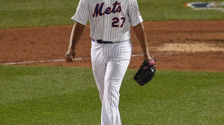New York Mets relief pitcher Jeurys Familia reacts after the Kansas City Royals score a go-ahead run during Game 4 of the World Series at Citi Field on Saturday, Oct. 31, 2015.