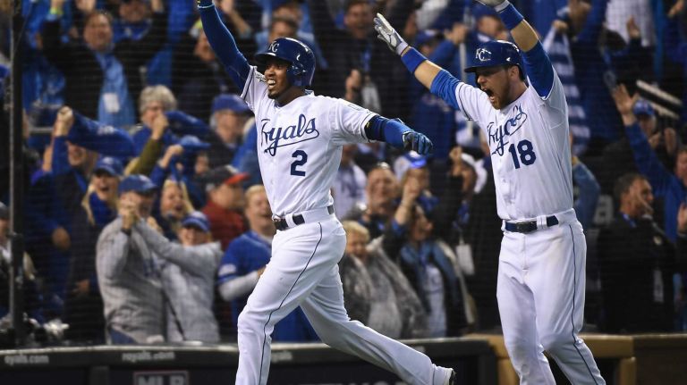 World Series Game 1: Mets vs. Royals 128 Kansas City Royals shortstop Alcides Escobar (2) celebrates the inside the park homerun as Kansas City Royals second baseman Ben Zobrist (18) celebrates behind him in first inning during Game 1 of the World Series against the Kansas City Royals at Kauffman Stadium on Tuesday, Oct. 27, 2015.