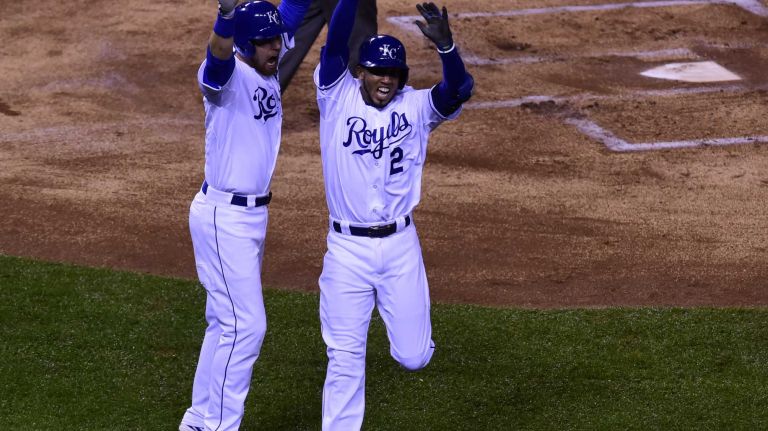 World Series Game 1: Mets vs. Royals 129 Kansas City Royals second baseman Ben Zobrist (18) high fives Kansas City Royals shortstop Alcides Escobar (2) after the inside the park homer during Game 1 of the World Series against the Kansas City Royals at Kauffman Stadium on Tuesday, Oct. 27, 2015.