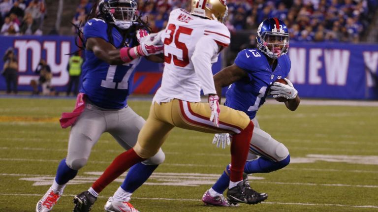 Odell Beckham #13 of the New York Giants runs with the ball after making a catch against the San Francisco 49ers at MetLife Stadium on Sunday, Oct. 11, 2015 in East Rutherford, N.J.