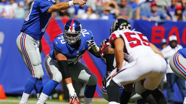 Quarterback Eli Manning #10 of the New York Giants directs from the line of scrimmage against the Atlanta Falcons during an NFL game at MetLife Stadium on Sunday, Sept. 20, 2015.