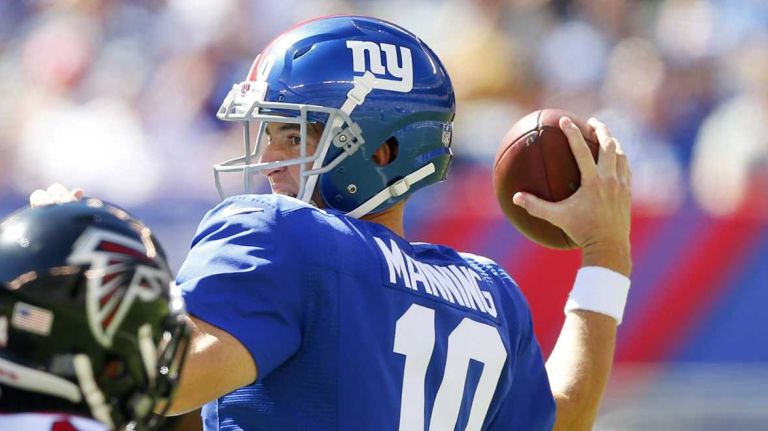 Eli Manning #10 of the New York Giants throws a pass in the first half against the Atlanta Falcons during an NFL game at MetLife Stadium on Sunday, Sept. 20, 2015.