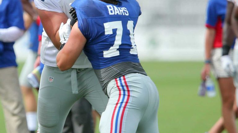 New York Giants tackle Sean Donnelly blocks defensive end Brad Bars during training camp at the Quest Diagnostics Training Center in East Rutherford, N.J., on Saturday, Aug. 8, 2015.