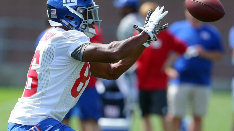 New York Giants tight end Jerome Cunningham makes a catch during training camp at the Quest Diagnostics Training Center in East Rutherford, N.J., on Saturday, Aug. 1, 2015.