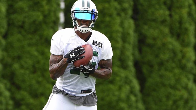 New York Jets wide receiver Brandon Marshall (15) makes a catch during practice at the Jets' Atlantic Health Training Center on Monday, August 10, 2015 in Florham Park, N.J.