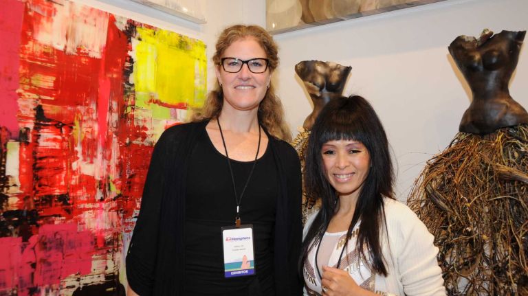 Vanessa Axelrad and Janet Sherban attend the opening Thursday, July 2, 2015, of ArtHamptons in Bridgehampton.