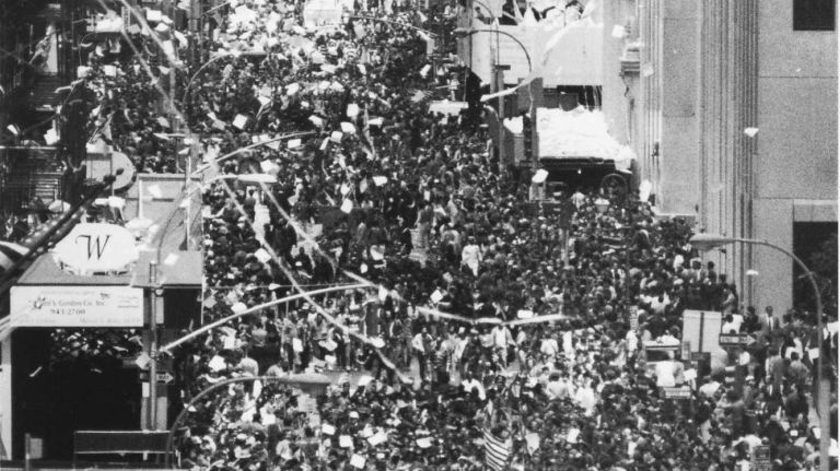 Vietnam veterans proceed down the Canyon of Heroes on Broadway in lower Manhattan in a parade in their honor. (May 7, 1985)