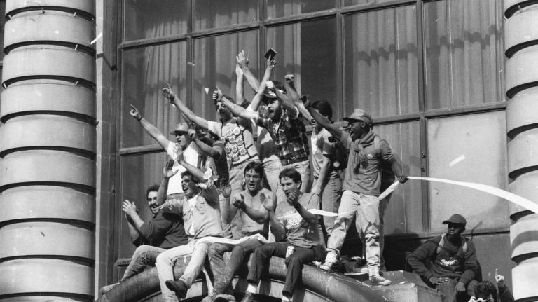Met fans go crazy during the ticker tape parade on Broadway in lower Manhattan celebrating their World Series victory. (Oct. 28, 1986)