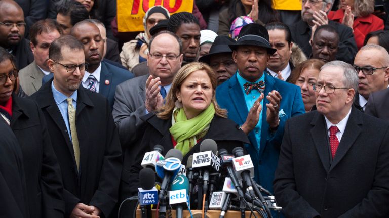 New York City Council Speaker Melissa Mark-Viverito, center, council members and state officials gather at the City Hall steps to denounce Donald Trump's  remarks on Dec. 9, 2015.