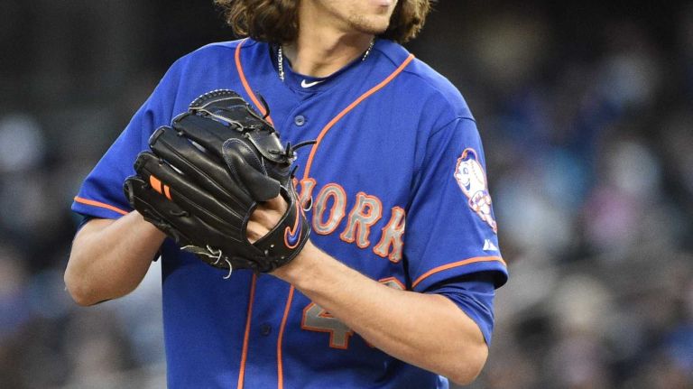 New York Mets starting pitcher Jacob deGrom delivers in the first inning against the New York Yankees in a baseball game at Yankee Stadium on Friday, April 24, 2015.