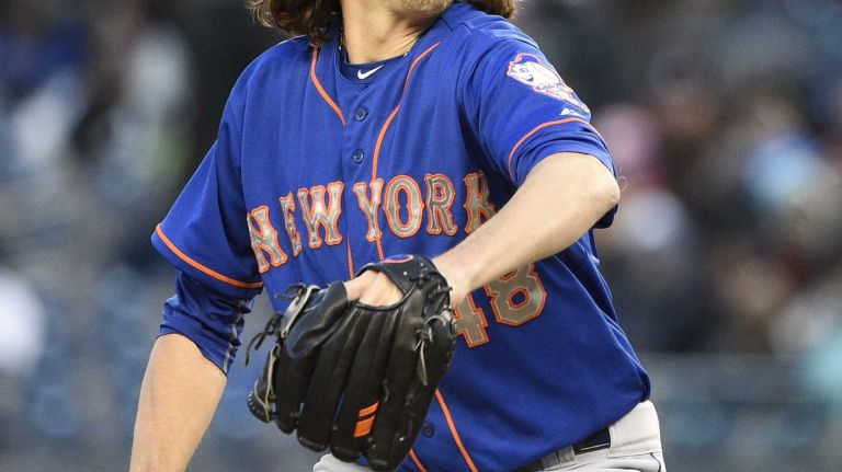 New York Mets starting pitcher Jacob deGrom delivers in the first inning against the New York Yankees in a baseball game at Yankee Stadium on Friday, April 24, 2015.