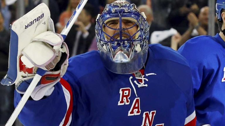 Henrik Lundqvist of the New York Rangers celebrates after defeating the Pittsburgh Penguins in overtime during Game 5 of the Eastern Conference Quarterfinals at Madison Square Garden on Friday, April 24, 2015.