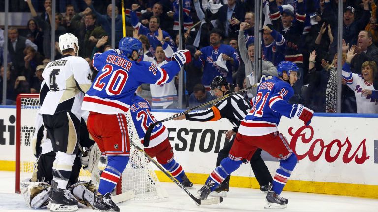 Derek Stepan of the New York Rangers celebrates his first-period goal against the Pittsburgh Penguins during Game 5 of the Eastern Conference Quarterfinals at Madison Square Garden on Friday, April 24, 2015.