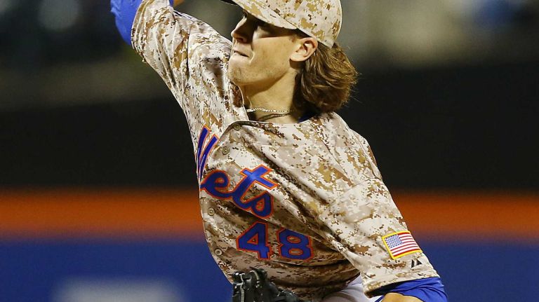 Jacob deGrom #48 of the New York Mets pitches in the sixth inning against the Miami Marlins at Citi Field on Monday, Sept. 15, 2014 in the Queens Borough of New York City.